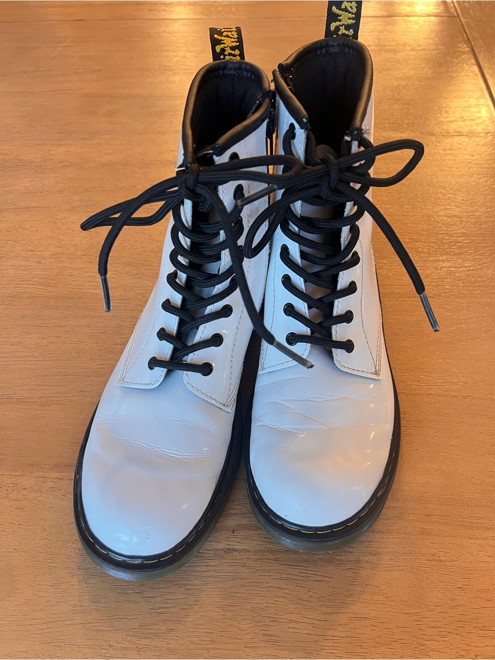 Dr. Martens White Patent Combat Boots with Black Accents